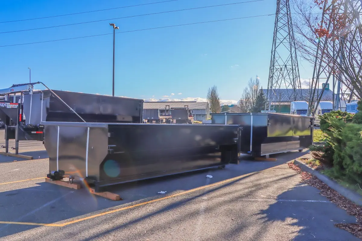 Roll-off dumpster ready for waste disposal at job site for 4 Yard Dumpster Rental in Darien